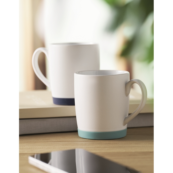 Taza de cerámica blanca mate con base de silicona