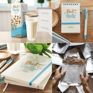 Libretas y bolígrafos del reciclaje de envases de leche